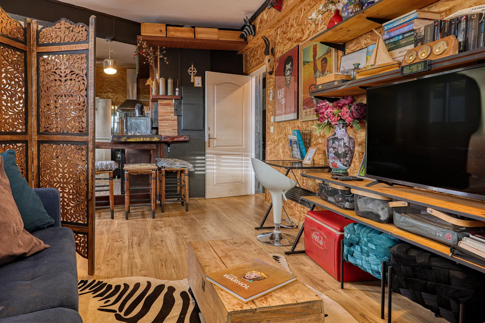 Salon avec canapé convertible du Lelaleu Appartement T2